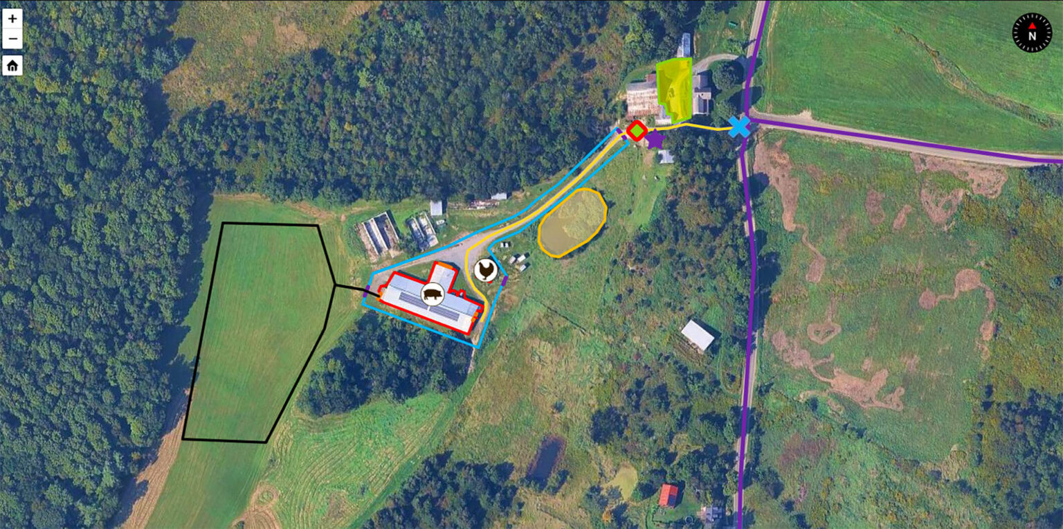 An overhead view of a livestock farm surrounded by green fields and forests, with markings on the map for biosecurity planning.