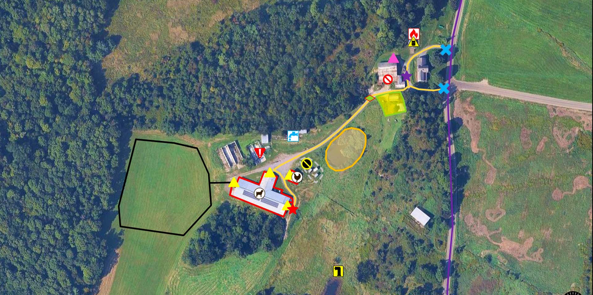 An overhead view of a livestock and poultry farm surrounded by green fields and forests, with markings on the map for biosecurity planning.